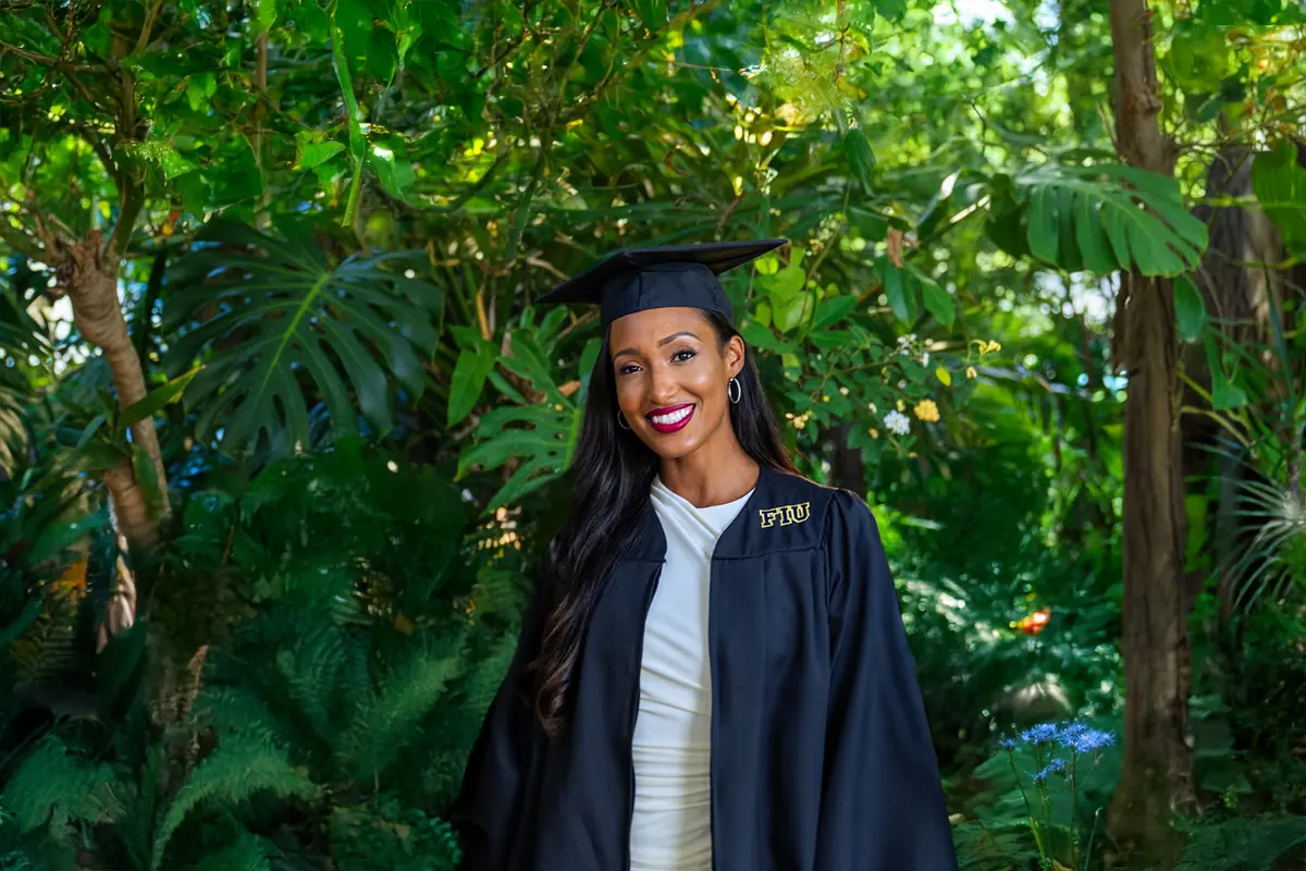 FIU graduate in cap and gown from ZAG’s FIU Online campaign
